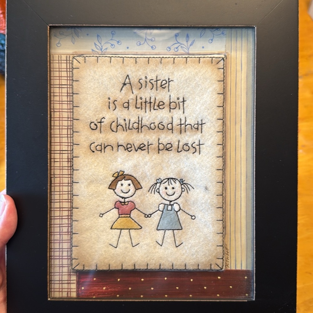 8.5 x 10.5 frame- “A sister is a little bit of childhood that can never be lost”